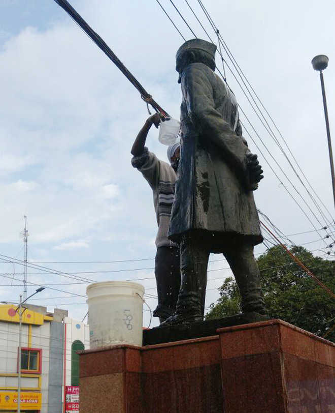 NGO activists wash Nehru’s statue