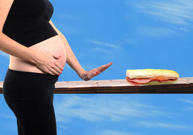''Common food-borne bacteria may up early miscarriage risk''