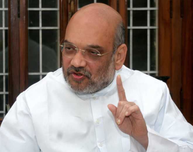 No post-poll alliance with BSP or any party in UP: Amit Shah
