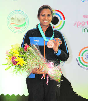 Pooja shoots bronze in WC opener