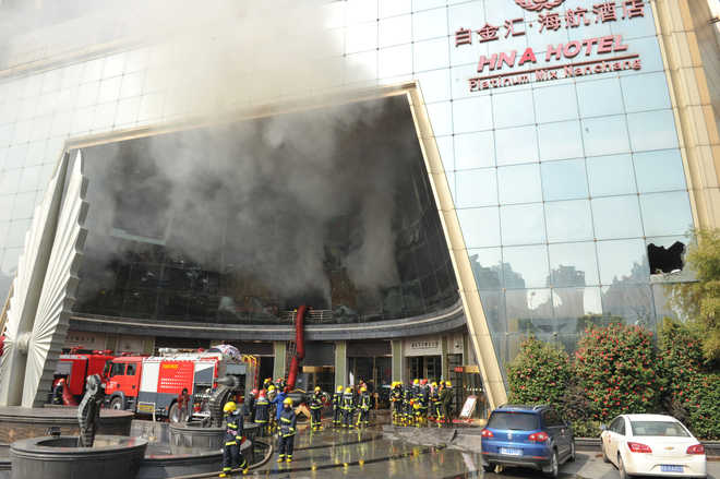 At least 10 killed, 14 injured in hotel fire in China
