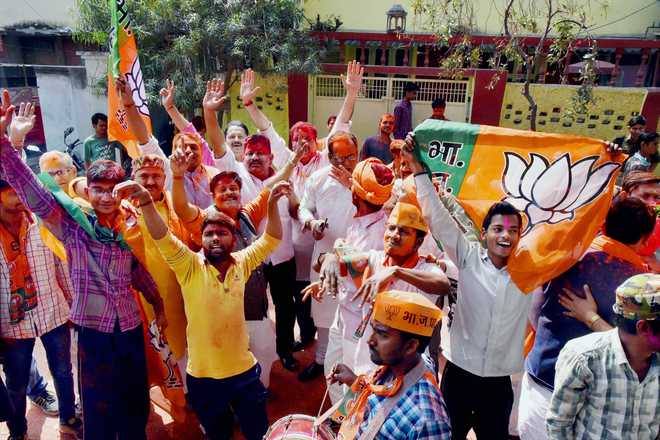 Saffron surge as BJP captures Uttar Pradesh, Uttarakhand
