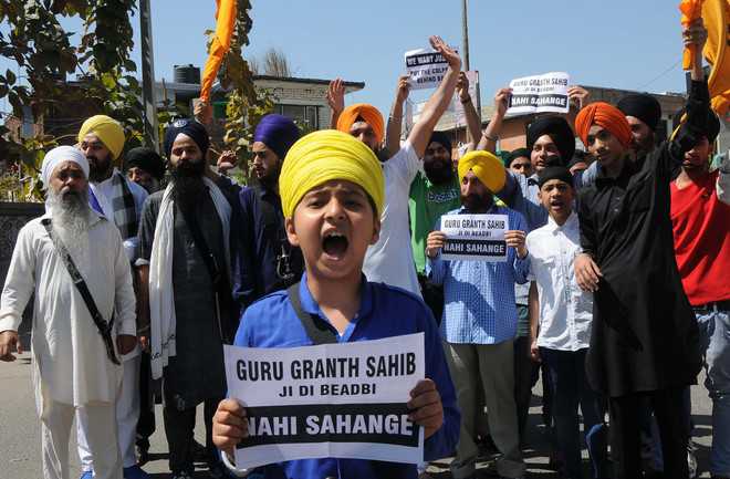 Sikhs protest against ‘desecration’ at gurdwara