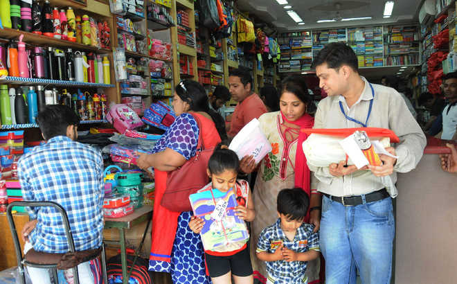 Harried parents queue up outside bookstores in city