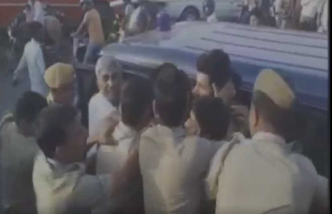 BJP leader clashes with cops after son challaned for black film on jeep
