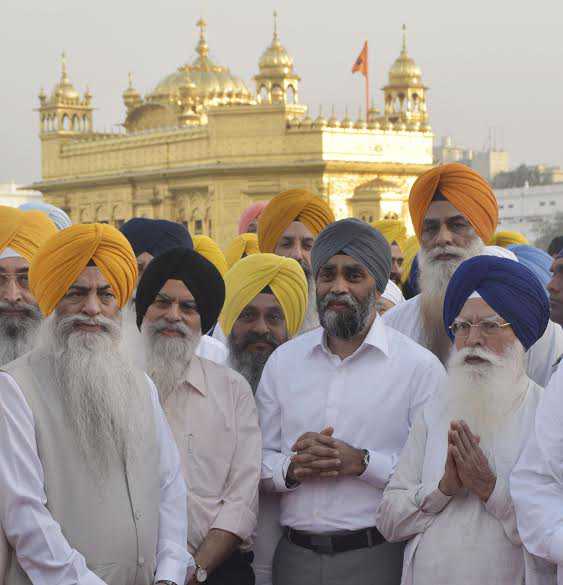 Canadian minister Harjit Singh Sajjan pays obeisance at Golden Temple