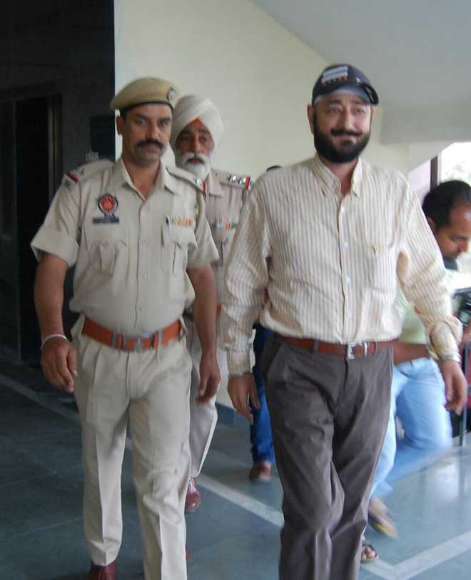 Wanted in rape case, suspended SP gives up