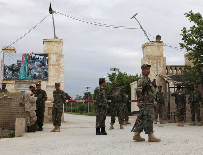 Death toll in Afghan military base attack rises to 140