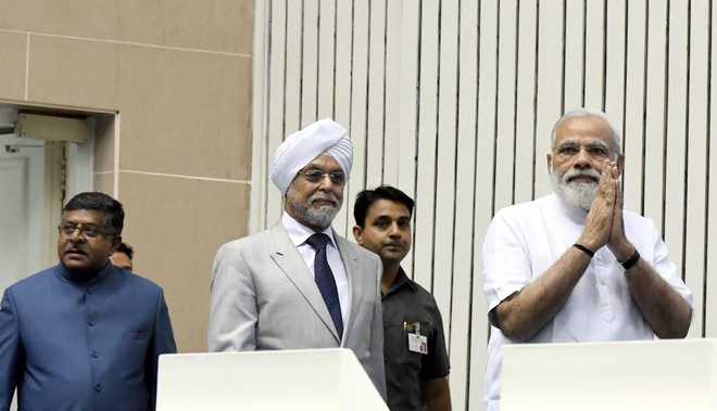 Modi launches digitised system; apex court to go paperless