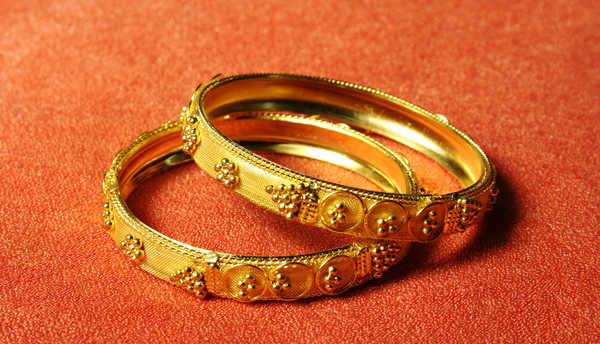 Gold bangles & a promise