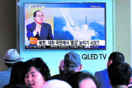 N Korea fires missile days after new South leader pledges talks