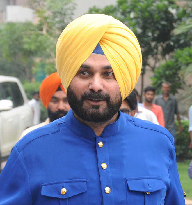 Probe illegal buildings in city: Sidhu to SDM