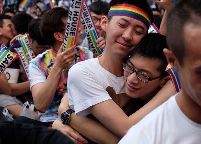 Taiwan court rules in favour of same-sex marriage, first in Asia