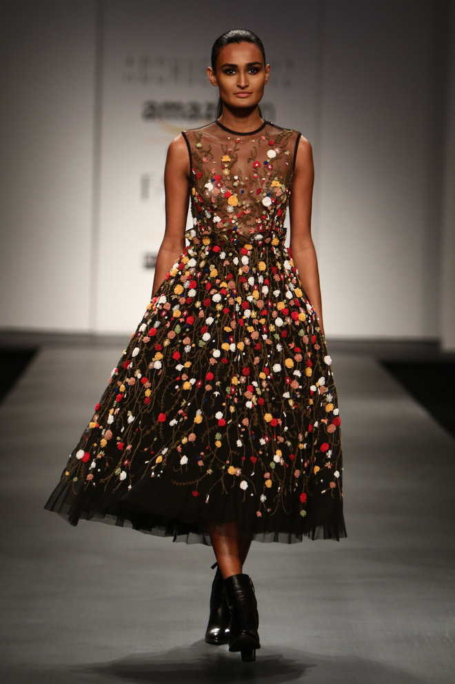 green emerald velvet dress India Fashion Week Blossoms in More Ways Than One