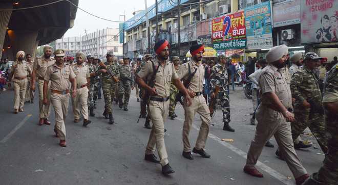 Police, paramilitary forces take out flag march