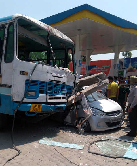 2 injured as bus hits electricity pole