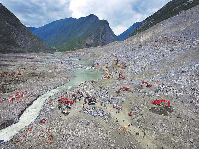Hopes fade for 93 missing in China landslide