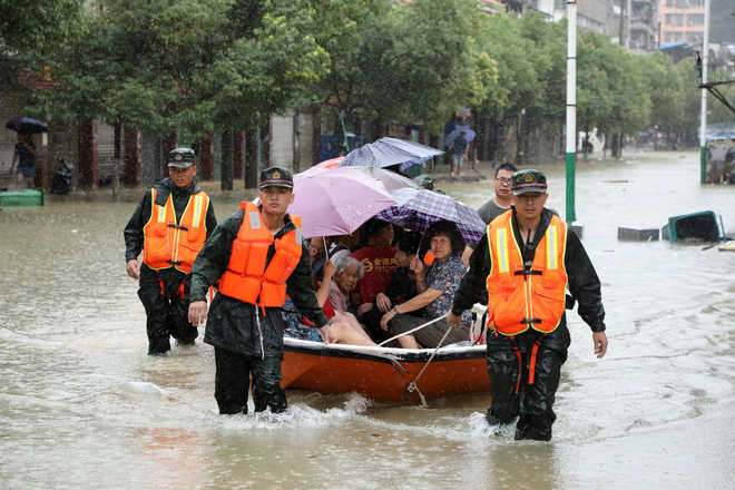 34 killed in China floods; 93 remain missing in landslide