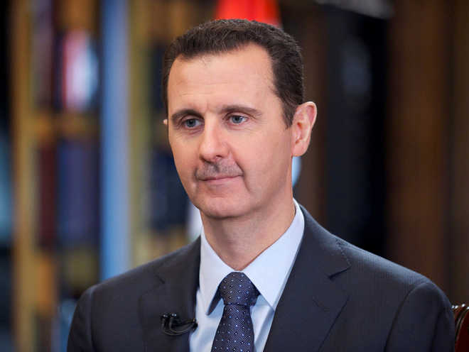 US says Assad may be preparing chemical attack