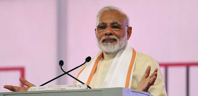 Killing people in the name of cows unacceptable: Modi