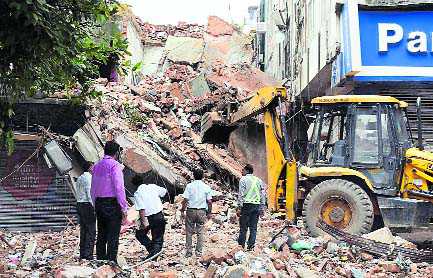 Four-storey building collapses in Laxmi Nagar; five injured - The Tribune