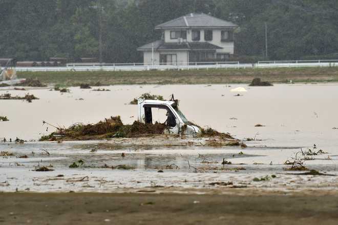 Japan flood toll rises to 18
