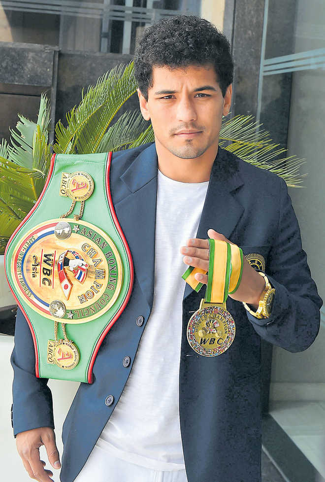 Neeraj to put WBC title on line in Vijender fight night