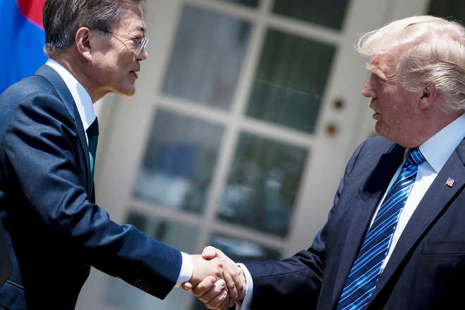 North Korea poses ‘grave and growing’ threat: Trump, Moon