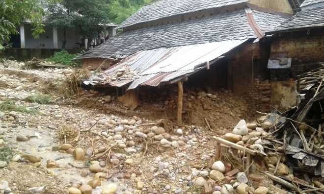 Landslide damages houses in Kangra