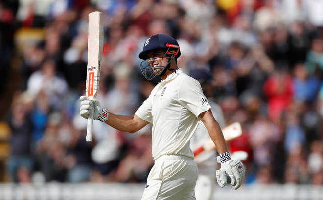 Cook hits double century, Anderson makes early strike