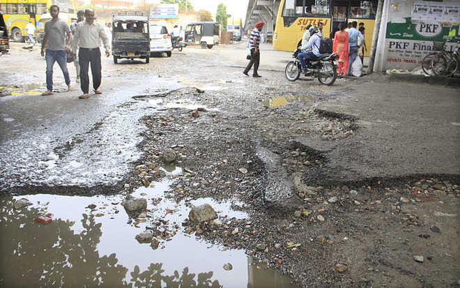 Heavy rains take their toll on city roads