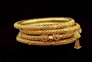 All for six gold bangles