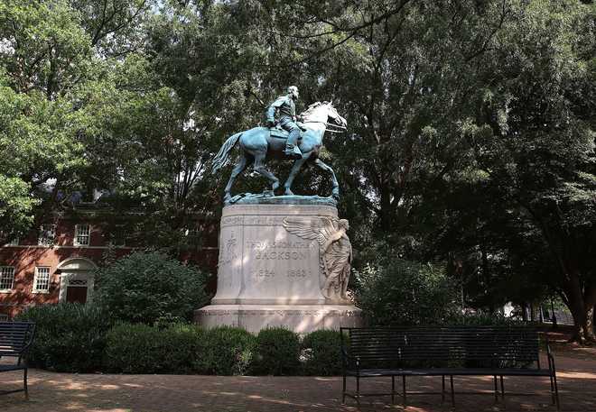 Charlottesville to cover Confederate statues after chaotic meeting