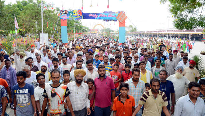 The scene within: Premis gather at Sirsa Dera in large numbers
