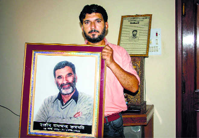 16 yrs on, son awaits justice for his father