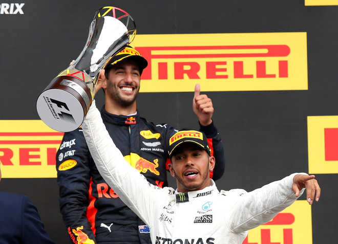 Hamilton marks 200th race with win : The Tribune India