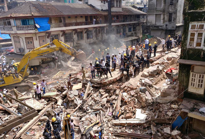 19 dead after over 100-year-old building collapses in Mumbai