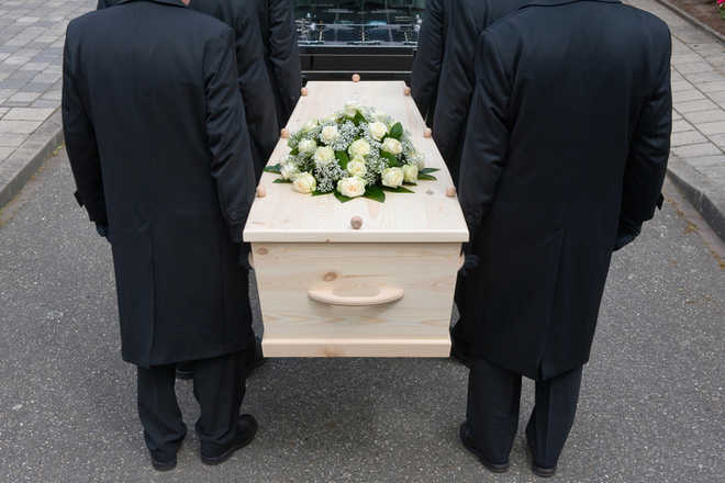 In faraway land, a ‘dear’ funeral
