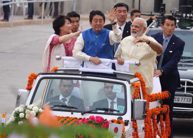 Modi, Abe hold road show in Ahmedabad, visit Sabarmati Ashram