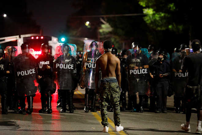 St. Louis protest turns violent after peaceful rallies against police acquittal