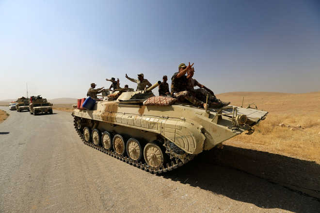 Iraqi forces free IS-held town near Syria border