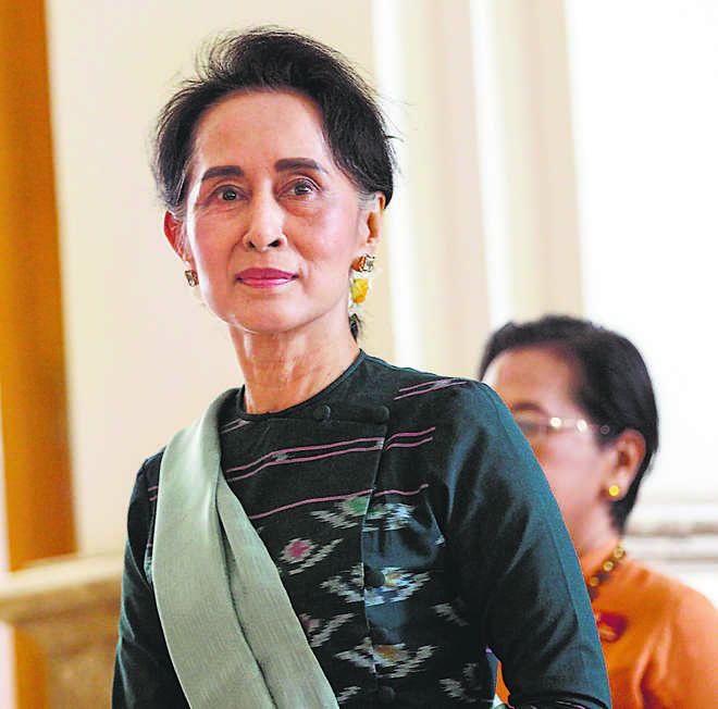 Suu Kyi speaks, but questions remain