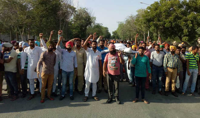 Thermal contractual employees protest,  demand regularisation of services