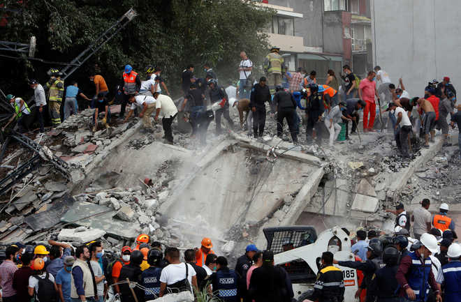21 schoolchildren among 248 dead in powerful Mexico earthquake