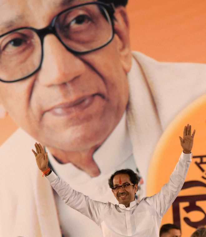 Sena says people still awaiting ‘achhe din’; slams BJP minister Chandrakant Patil