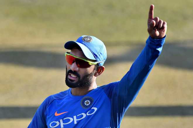 Injured Saha out, Karthik roped in for 3rd Test against SA