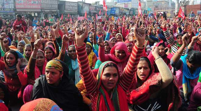 Regularisation: Anganwadi, ASHA workers stage sit-in