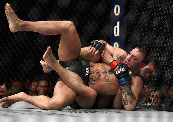 Brawls overshadow Khabib’s UFC title win over McGregor