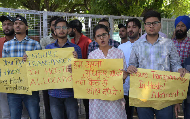 PUCSC protests hostel allotments,  fee hike at dental institute