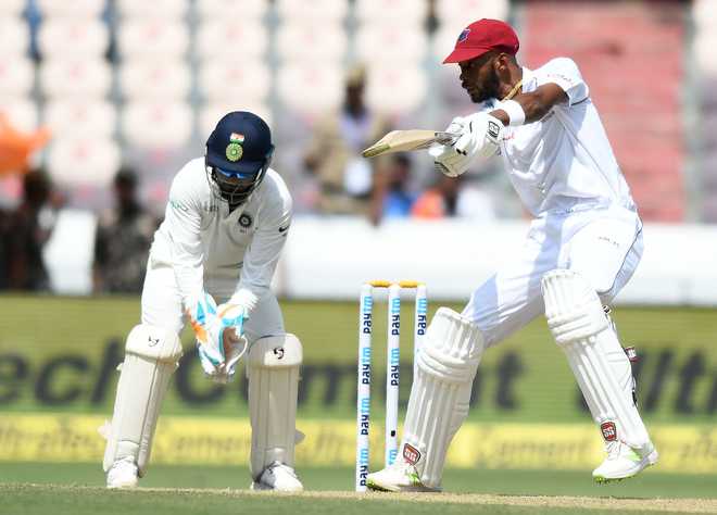 Roston Chase defies India as West Indies score 295/7